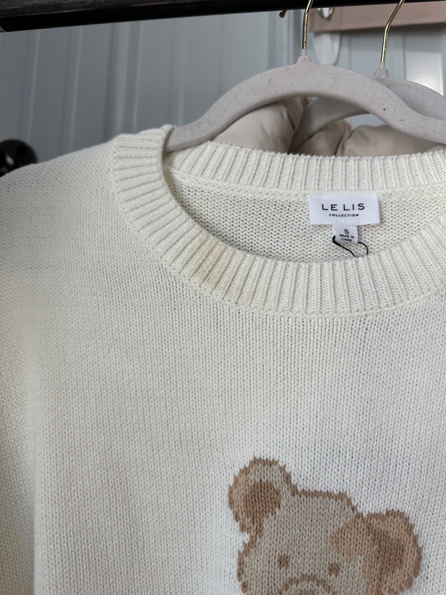 Lightly loved teddy sweater