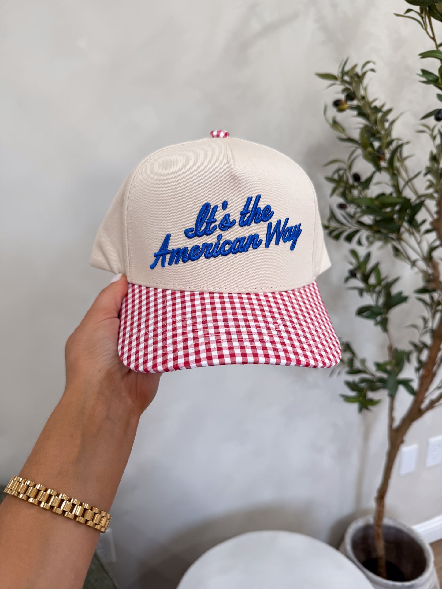 It's the American Way Trucker Hat - red gingham