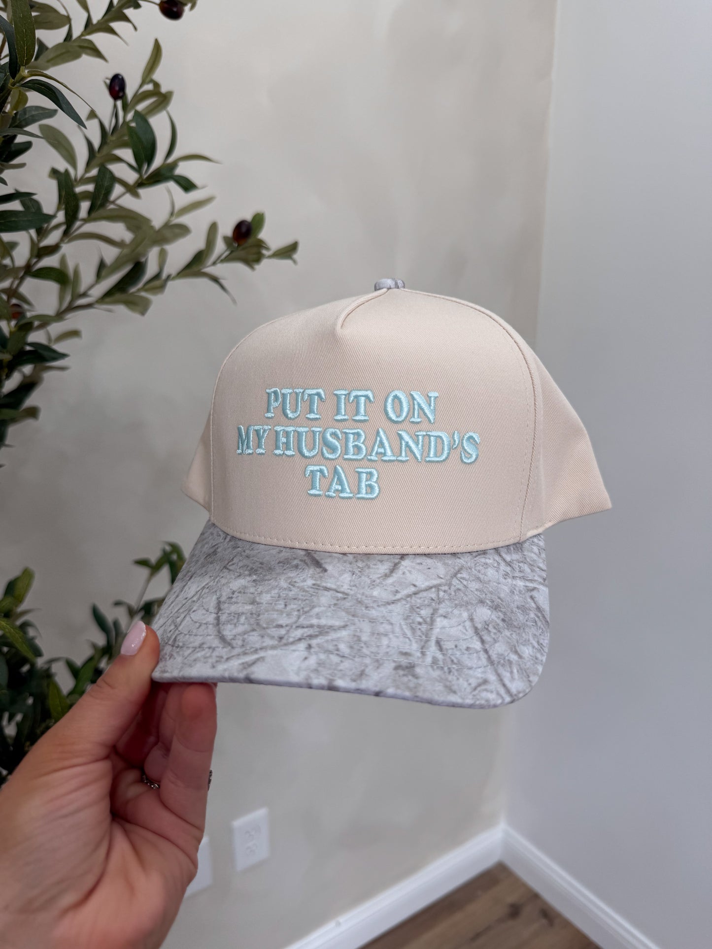 Put It On My Husband's Tab Trucker Hat - white camo