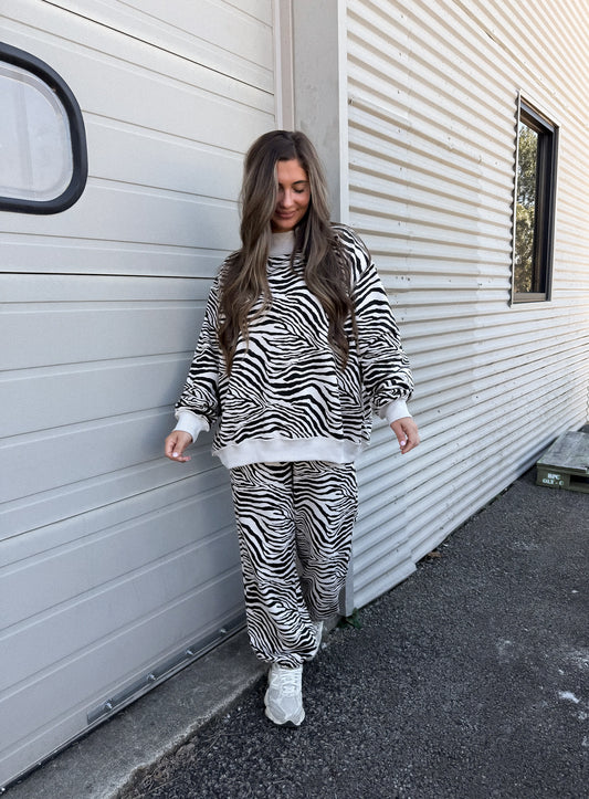 Born Wild Zebra Print Mock Neck Pullover