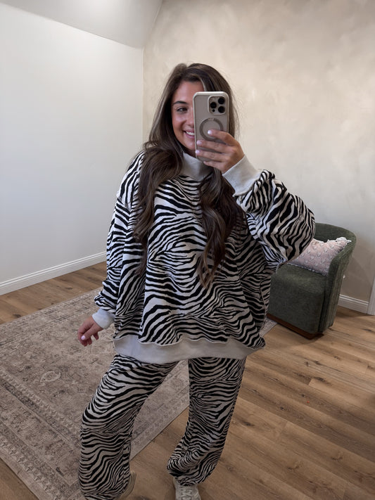 Born Wild Zebra Print Mock Neck Pullover