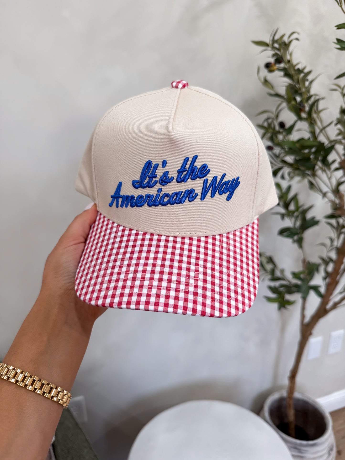 It's the American Way Trucker Hat - red gingham